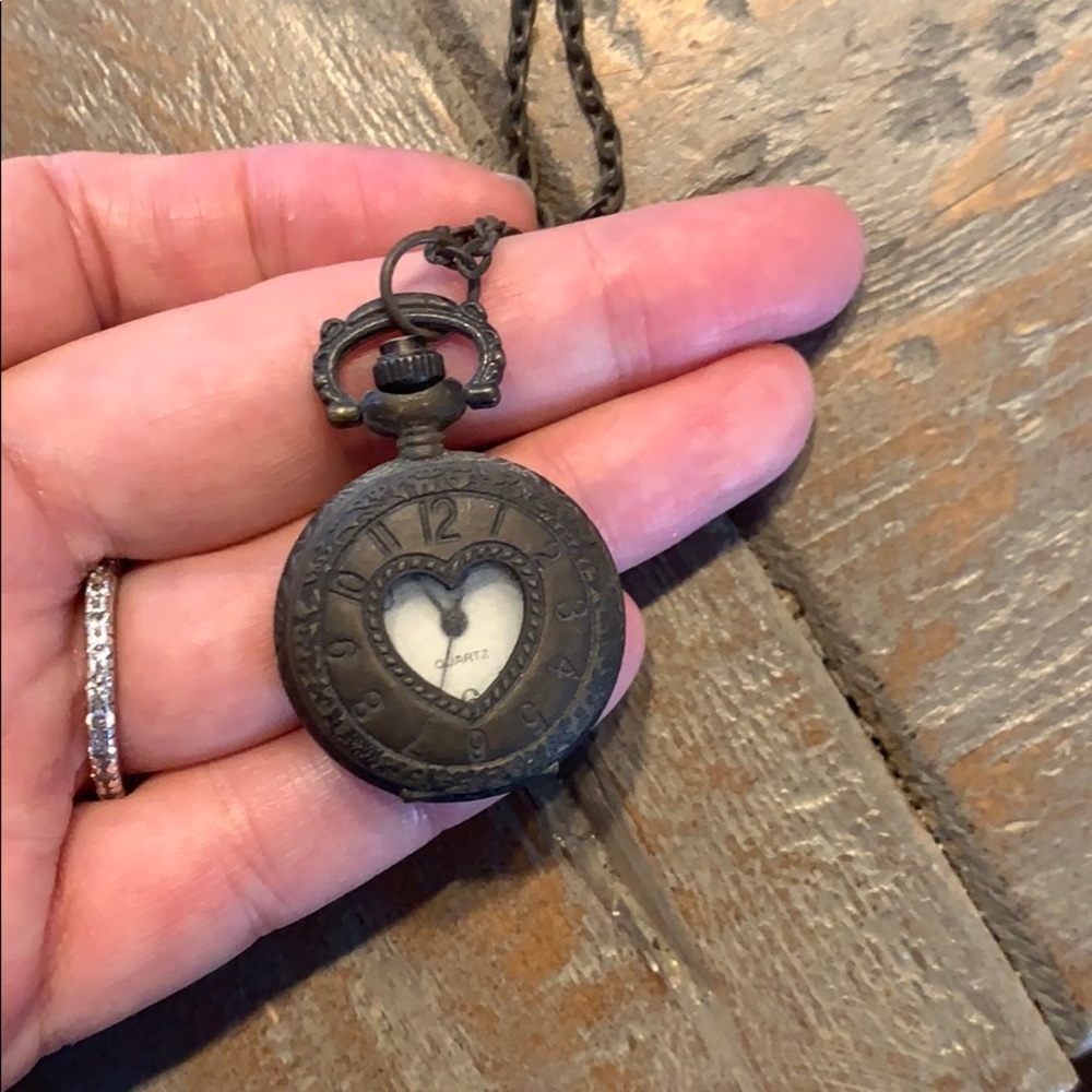 Brushed bronze clock locket